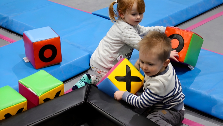 toddlers play with blocks