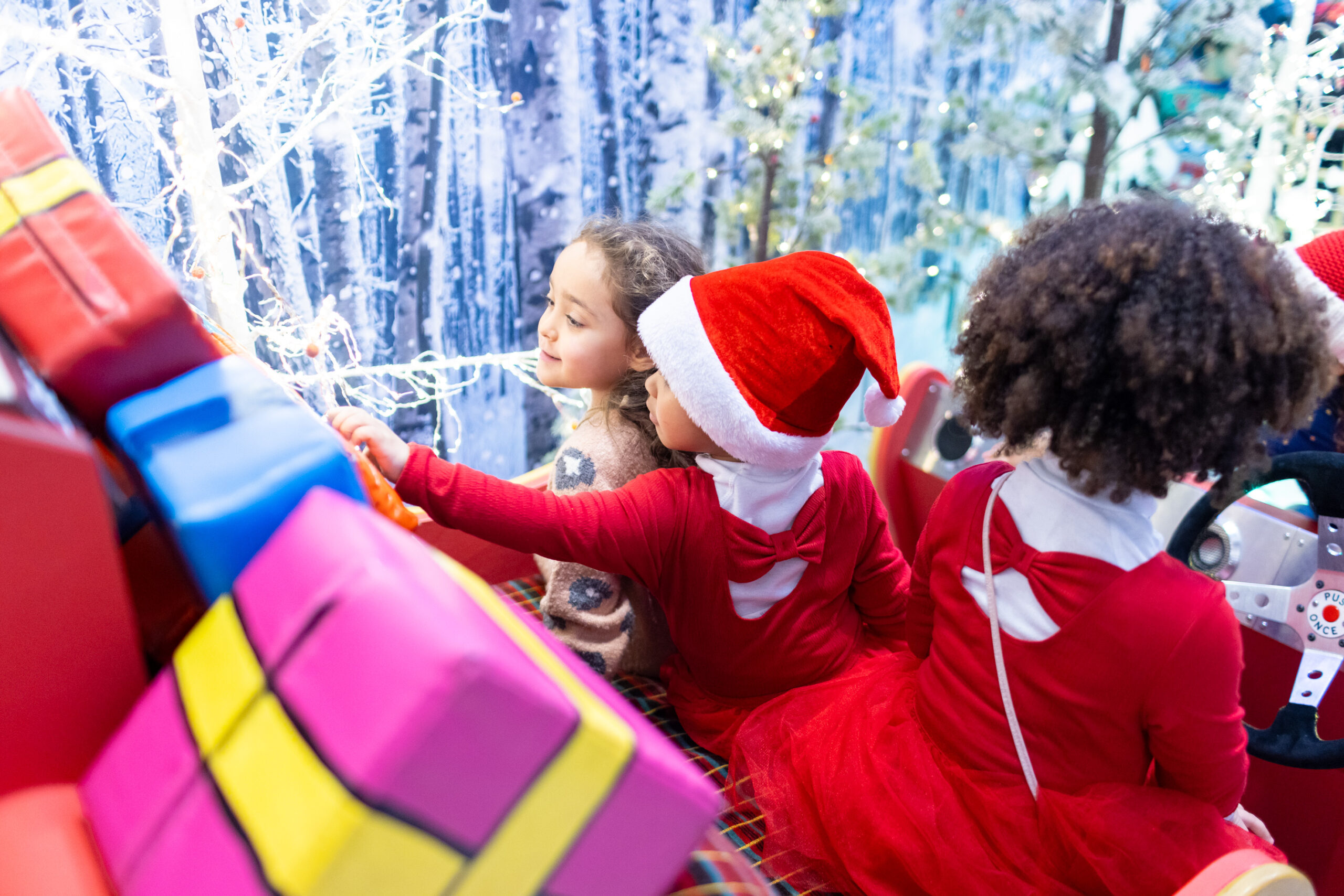 kids picking up presents