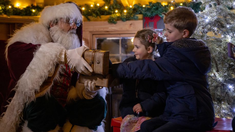 boy and girl meet santa