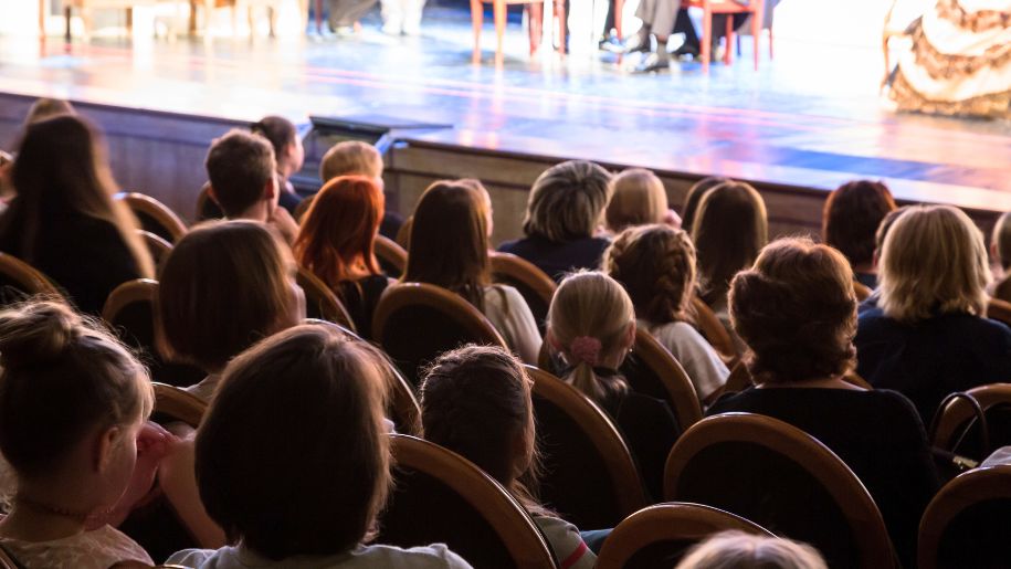 audience watching stage show
