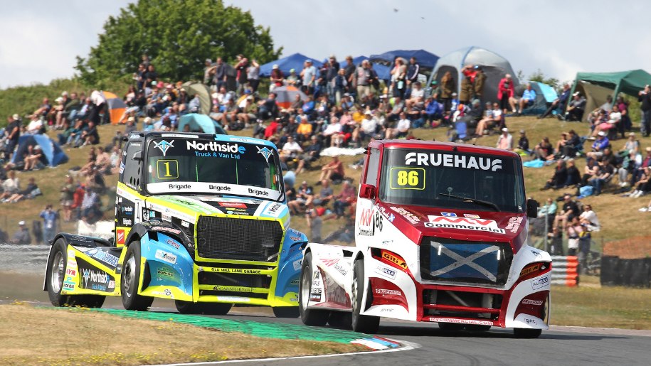 Trucks on a race circuit.