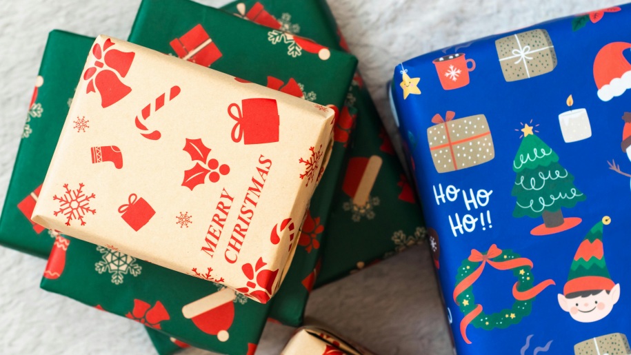 A pile of wrapped Christmas presents.