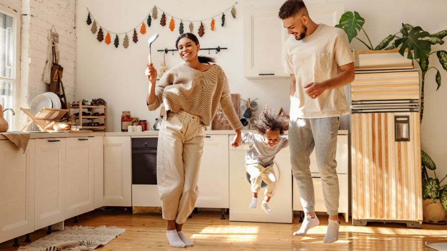 family dance in kitchen