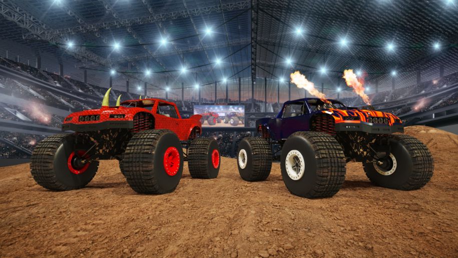 two big trucks with massive wheels, one red and one blue