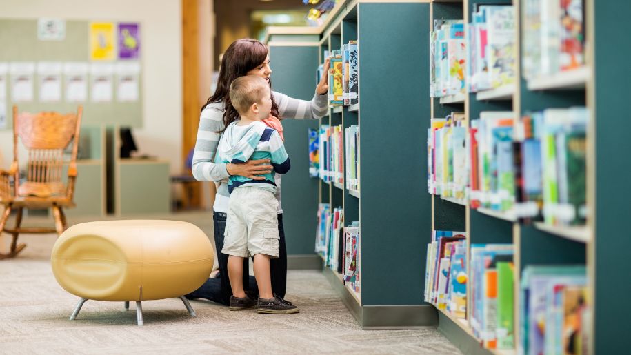 mother and young boy at library