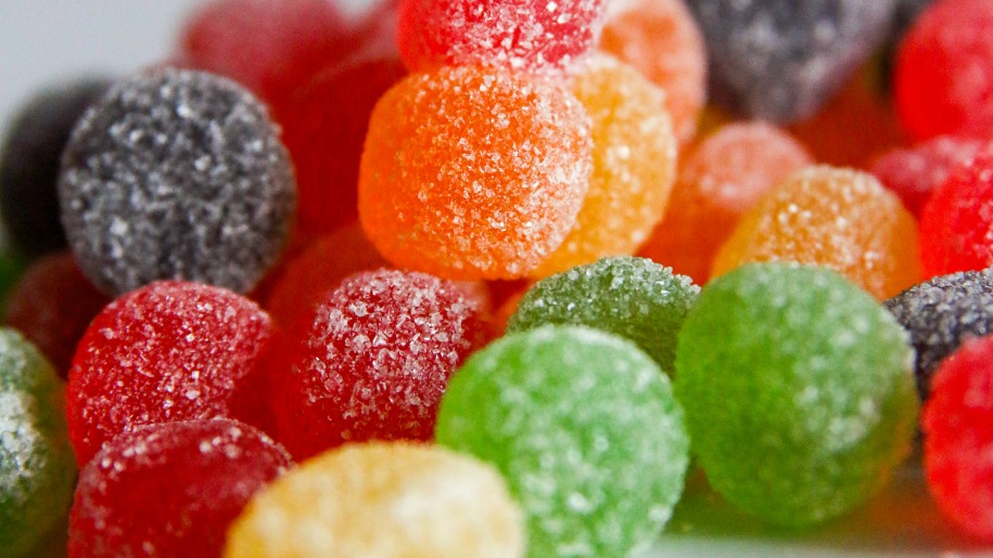 A heap of sugared jelly sweets in different colours.