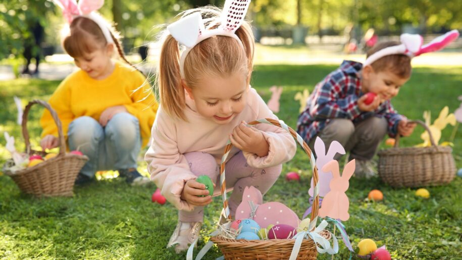girl and boy doing a easter egg hunt