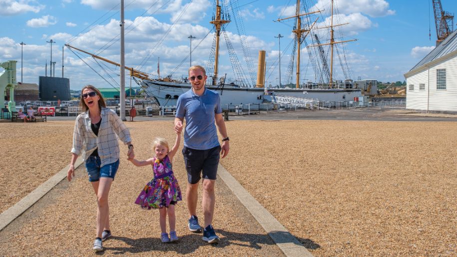 family walk in dockyard