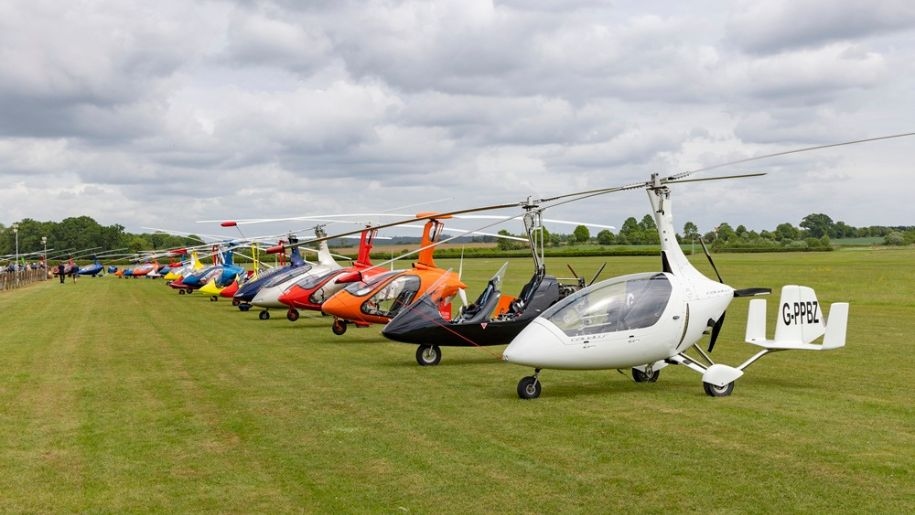 Line-up of gyroplanes on the airfield at Shuttleworth.