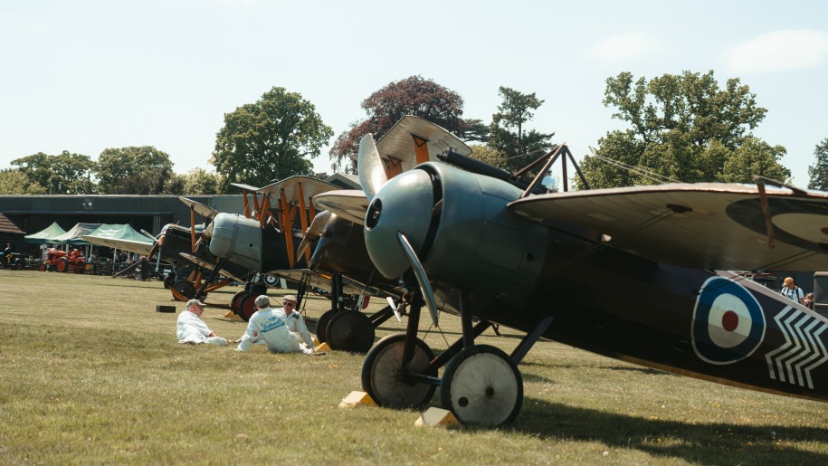 Aircraft lined up on the airfield at Shuttleworth.