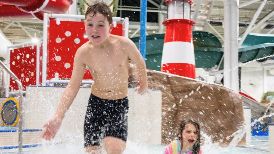 kids splash through water