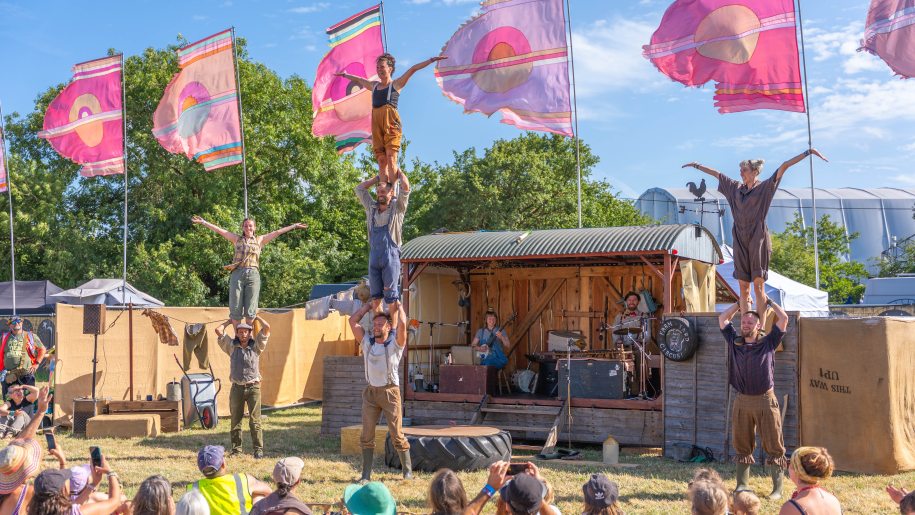 Acrobats in finale of outdoor show.