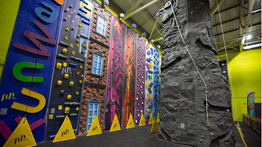 Colourful indoor climbing wall.