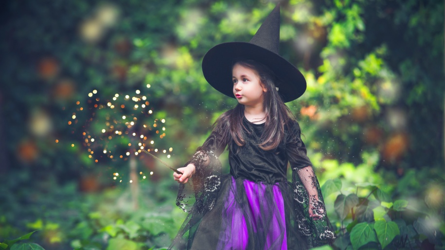 Girl dressed as a witch for Halloween.